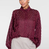 Blouse with fringes