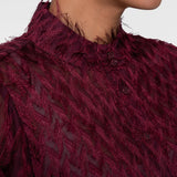 Blouse with fringes