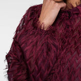 Blouse with fringes