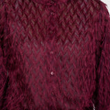 Blouse with fringes