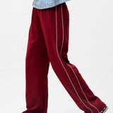 Tracksuit trousers with piping