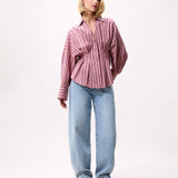 Blouse with waist pleats