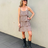 Dress with thin straps and multiple ruffles