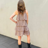 Dress with thin straps and multiple ruffles