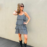 Dress with thin straps and multiple ruffles