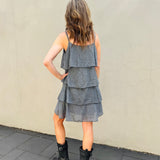 Dress with thin straps and multiple ruffles