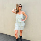 Dress with straps and ruffles