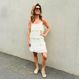 Dress with straps and ruffles