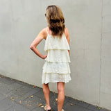 Dress with straps and ruffles