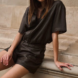 Blouse jacket with coated finish