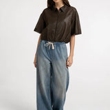 Blouse jacket with coated finish