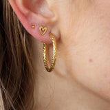 Drawn heart studs