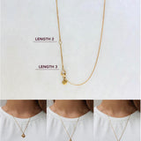 Hidden pearl necklace gold